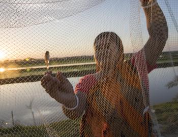 Woman fishing in Bangladesh