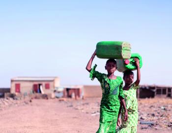girls collecting water 