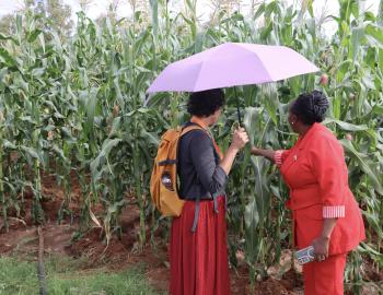 Hon. Rita Ndunge, County Executive Committee Member (CECM) of Water, Irrigation, Environment, and Climate Change, and Fatema Rajabali CDKN Africa lead, at the Miu-Mwala Irrigation Weir in Mwala-Makutano Ward, Machakos. 