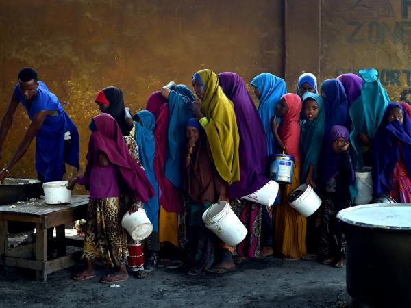 UN Photo/Tobin Jones. Young girls line up at a feeding centre in Mogadishu, Somalia