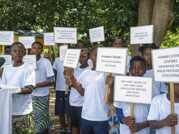 Politicians, legislate further to protect our ecosystems. Children's ambassadors call for biodiversity conservation in central Benin.  Credit: SURVIE NGO, Benin.