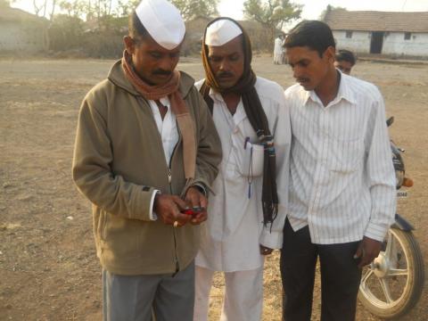 Farmers reading the SMS-based heat-health advisory