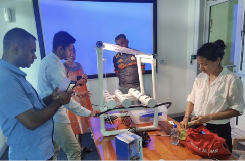 Recipients of the Smart Gro Box hydroponic kits receive training on how to use them for successful agriculture in an informal settlement in Fiji (Courtesy of Smart Farms)