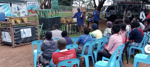 Sample Uganda field workers show the community how the ADMIRE aquaponic kit works to farm fish and vegetables in urban settings (Cred. Sample Uganda)