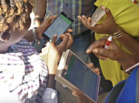 Women engaging in a mapping workshop hosted by Humanitarian Open Streets (Courtesy of HOT)